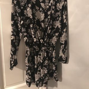 LONG SLEEVED FLORAL ROMPER